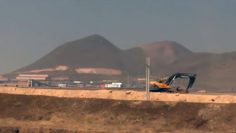 An excavator works on a section of the Letpadaung copper mine site in Sagaing region's Salingyi township, in a file photo. Credit: RFA