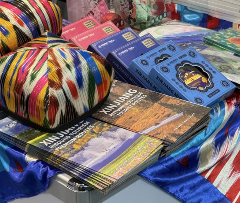 Travel brochures and other items are seen at the Xinjiang booth at the World Travel Market in London in November 2024.